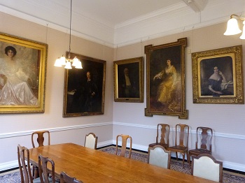 Pictures hanging inside the wilson room